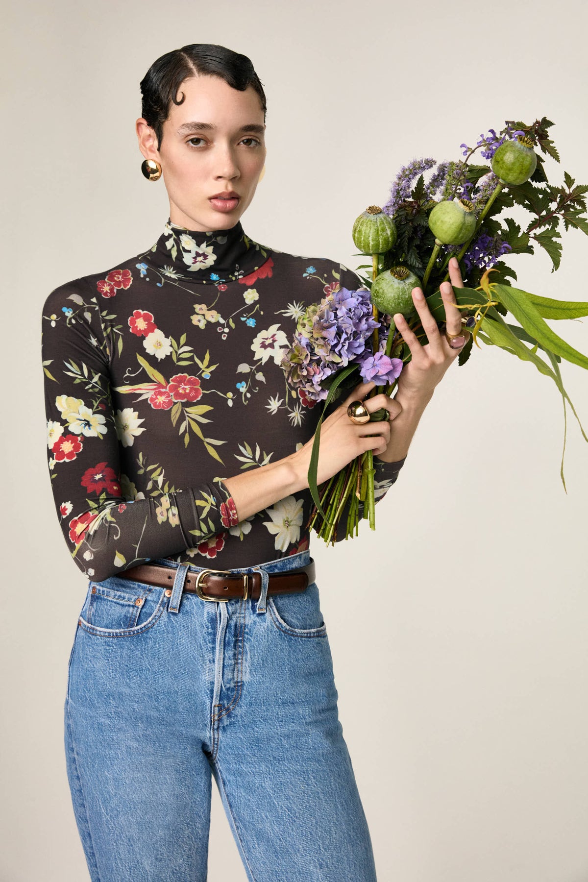 Céleste Testa di moro high-neck bodysuit, half-length view, with purple and green flowers
